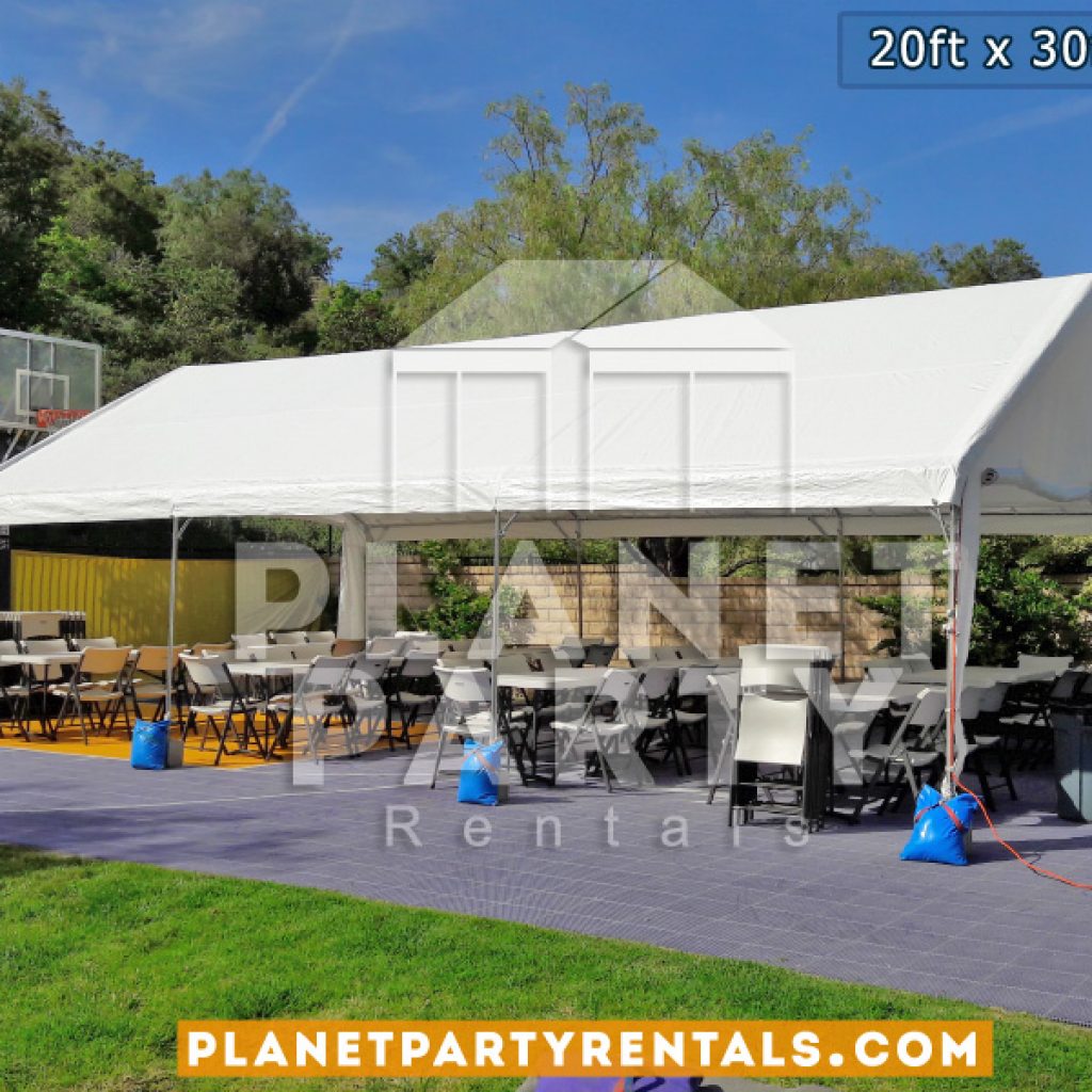 20x30 Tent on basketball court with plastic chairs and rectangular tables