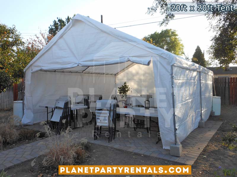 Medium sized party tent 20x20 Tent, white plastic chairs and rectangular tables